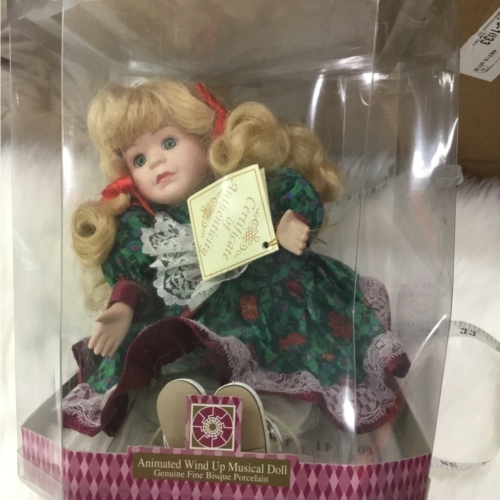 Soft Expressions Animated wind up musical doll